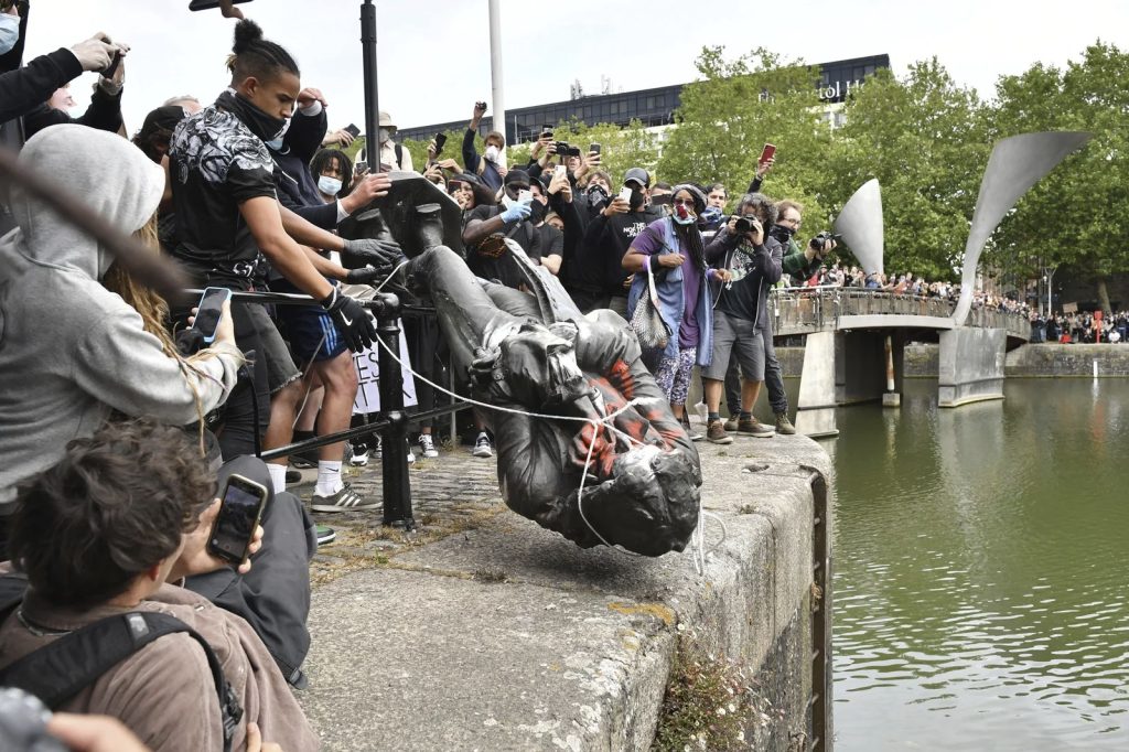 The Colston Statue is thrown into the River Avon